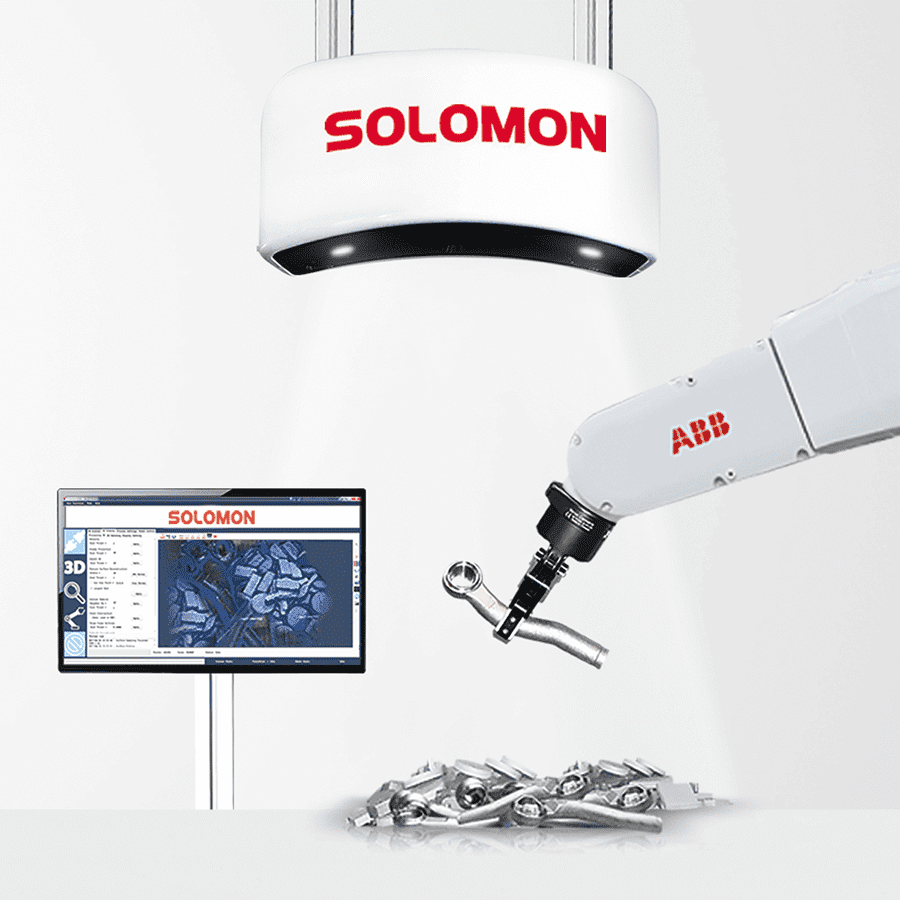 Solomon AccuPick 3D deep learning software integrated with robotic arm picking defective metal object from pile of similar metal objects